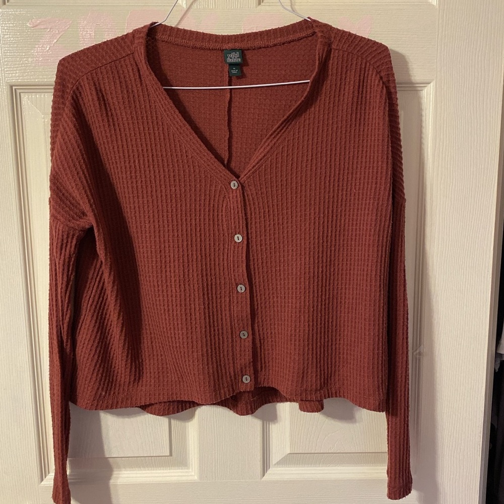 Bergundy long sleeve shirt that is also a cardigan